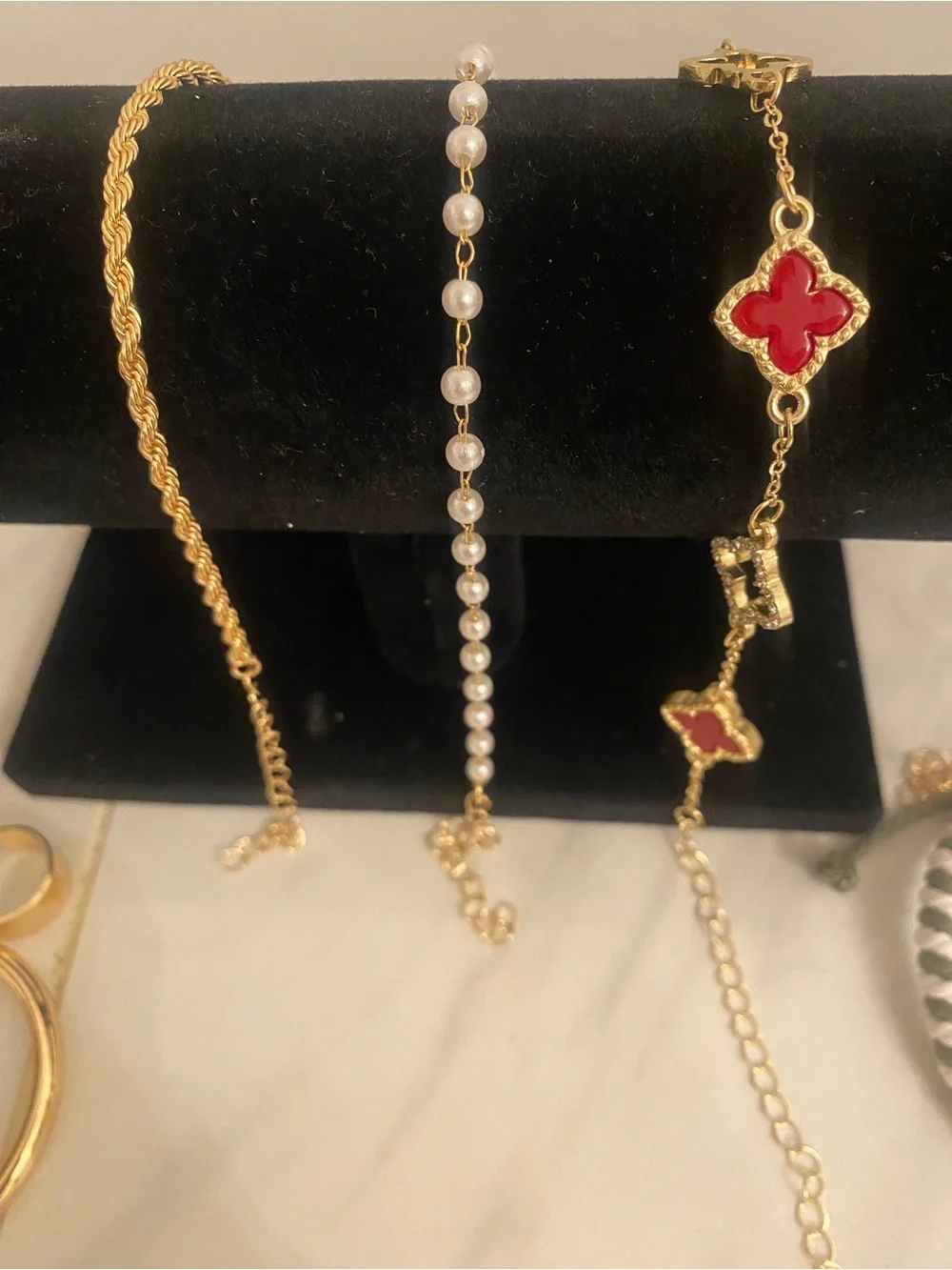 Gold Tone Women’s Bracelet with Red Clover Accents